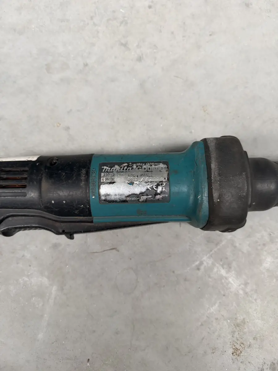 Tabliczka znamionowa szlifierki Makita GD0600