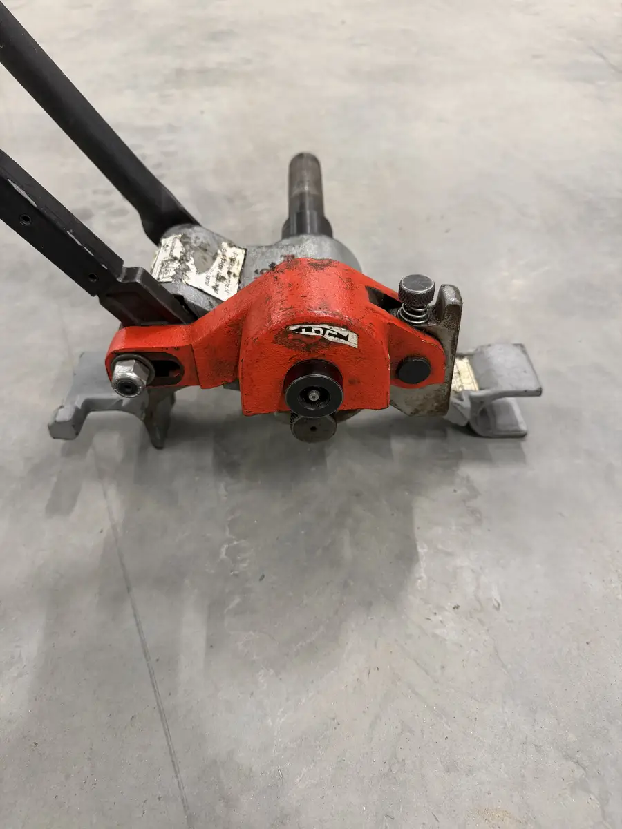 Rolki rowkujące i mechanizm docisku rowkarki RIDGID 916
